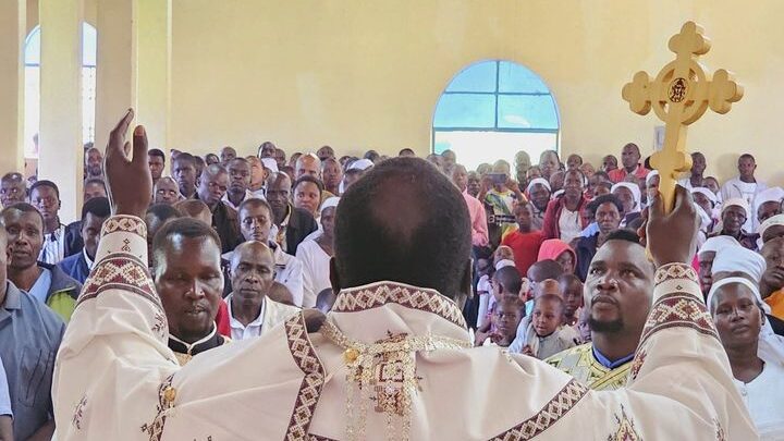 His Grace Bishop Neofitos blesses the people.